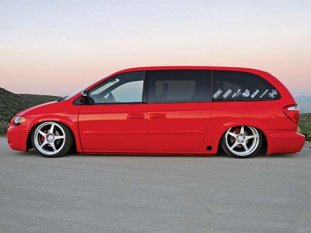 apcvan Who would expect APC of all comapnys to be involved in the build a a supercharged rwd dodge Caravan that looks badass?