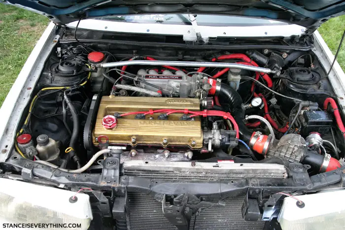 Mazda 323 GT motor, shame about the cold valve cover