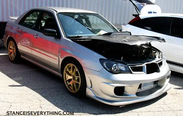 silverwrx Silver pig nose with gold wheels