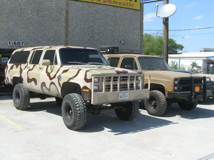 Two full size lifted Suburbans