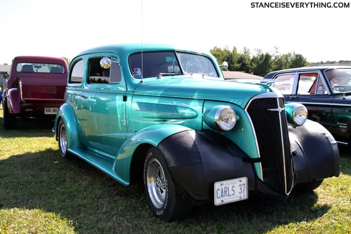 Carls teal 37 sittin just right on American Racing Rims