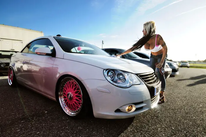 This owner uses pink accents to set off her modifications