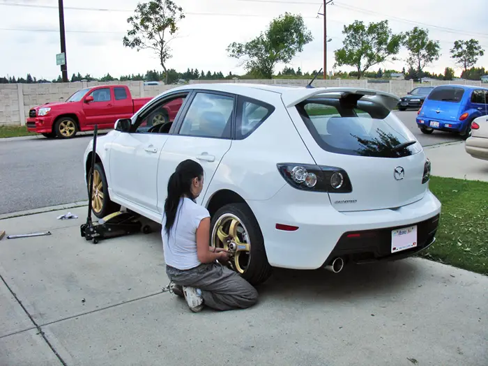 The owner putting on her first set of wheels  pre wide body
