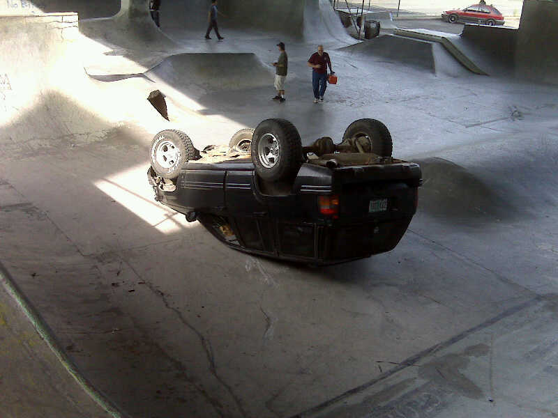 parkflipped2 Maybe that Subaru in the back could pull it out