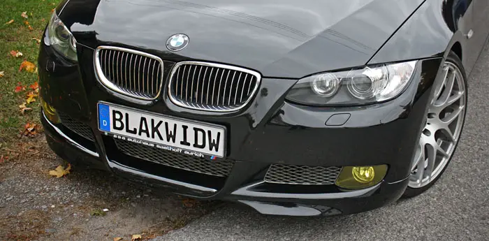 10 BMW-oem lip kit, blacked out grills, and yellow fogs finish up the front end