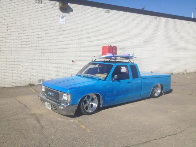 Dusted off my Low Class Customz login to grab a photo of Jeff's Tiki truck with the new surffboard